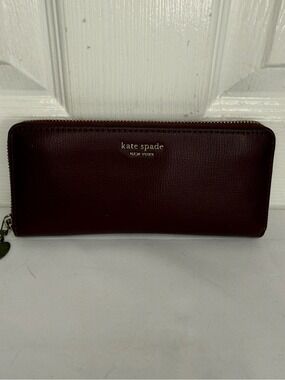 KATE SPADE, NEW YORK LARGE CONTINENTAL WALLET DEEP BURGUNDY
